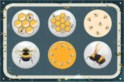 A metal tin containing 6 small, circular magnets with bees