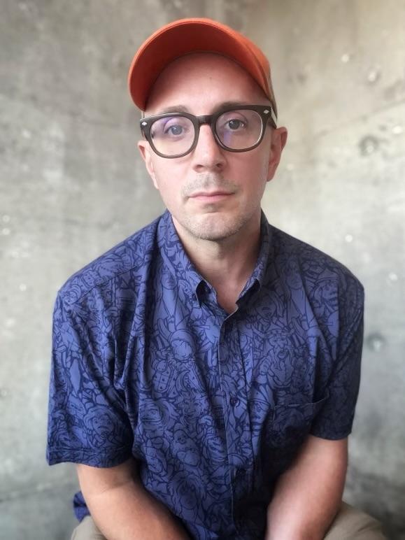photo of Steve Burns with blue shirt and orange cap